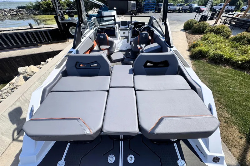 Slide: The Image of 2026 Scarab 235 LX Wake boat with spacious seating and modern design. - 12