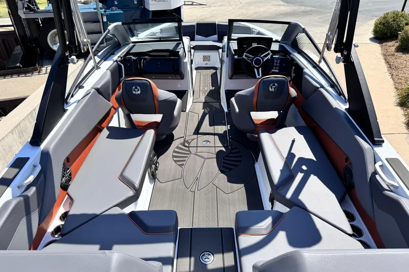 Slide: The Image of 2026 Scarab 235 LX Wake boat interior with modern seating and sleek design. - 17