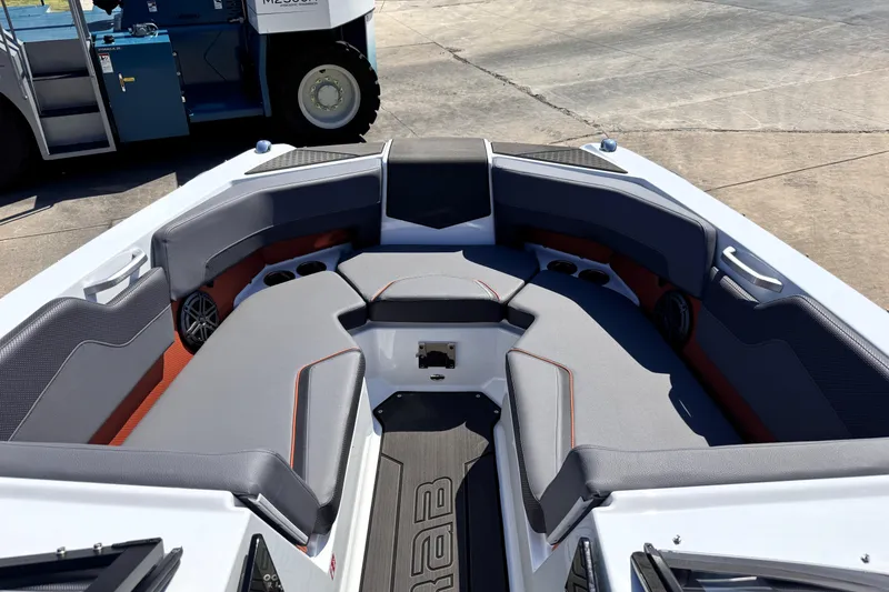 Slide: The Image of 2026 Scarab 235 LX Wake boat interior with gray seating and modern design. - 20