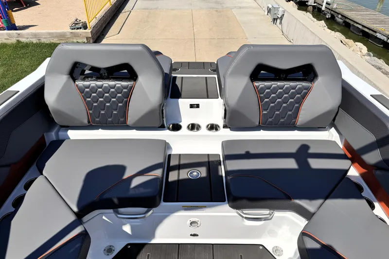 Slide: The Image of 2026 Scarab 235 LX Wake boat interior with stylish gray seating and modern design. - 7