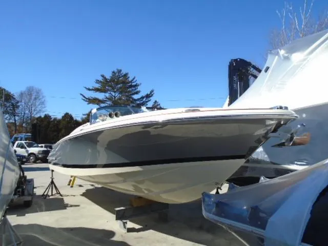 Slide: The Image of 2021 Chris-Craft Launch 27 boat displayed outdoors on a sunny day. - 11