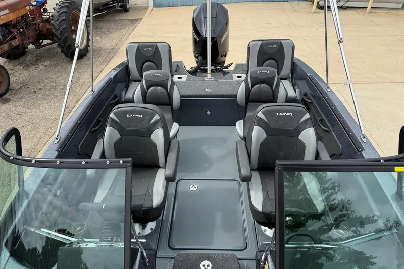 Slide: The Image of Open storage compartment in 2026 Lund 189 Tyee GL boat, showing interior details. - 15