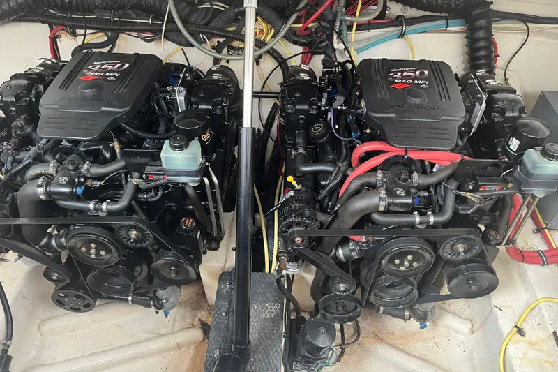 Slide: The Image of Twin MerCruiser 350 engines in a 2003 Chaparral 310 Signature boat. - 3