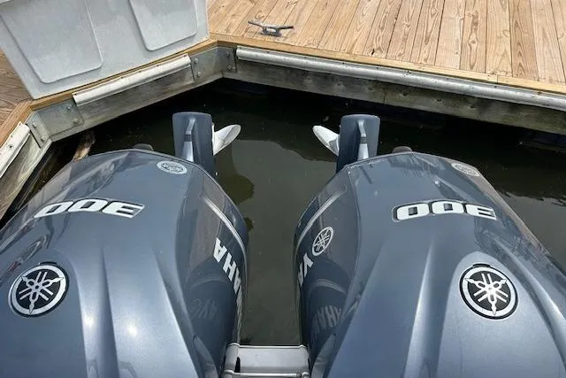 Slide: The Image of Twin Yamaha 300 outboard engines on a 2022 Cape Horn 32 T boat at dock. - 17