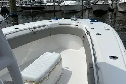 Slide: The Image of 2022 Cape Horn 32 T boat docked, featuring spacious deck and seating area. - 3