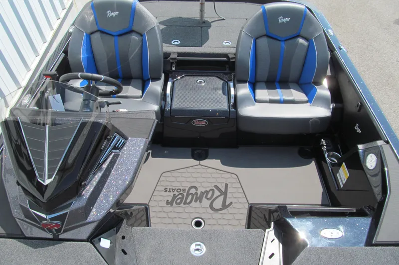 Slide: The Image of 2026 Ranger Z520 boat interior with dual seats and steering console. - 11
