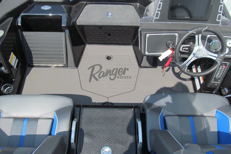 Slide: The Image of Interior view of 2026 Ranger Z520 boat cockpit with steering wheel and seating. - 12