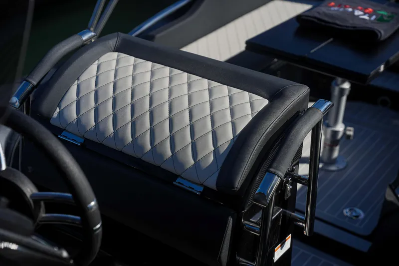 Slide: The Image of Luxurious seating detail of the 2023 SPX RIB 25 Dinette boat. - 22