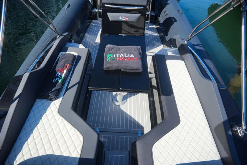 Slide: The Image of 2023 SPX RIB 25 Dinette boat interior with Italia Yachts towel. - 4