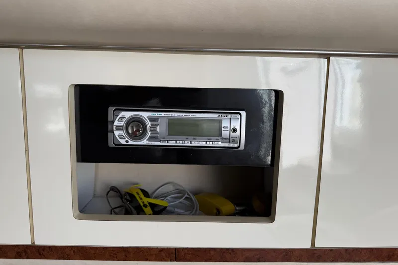 Slide: The Image of Marine stereo system in a 1996 Sea Ray 330 Sundancer boat interior. - 35