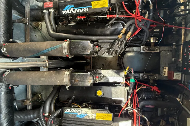 Slide: The Image of Engine compartment of a 1996 Sea Ray 330 Sundancer with MerCruiser components. - 44