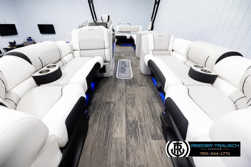 Slide: The Image of Luxurious interior of 2026 Avalon Excal LTD CRB boat with plush seating and modern design. - 13