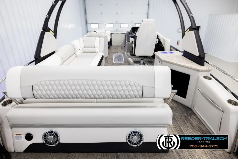 Slide: The Image of Luxurious interior of 2026 Avalon Excal LTD CRB boat with plush seating and modern design. - 16