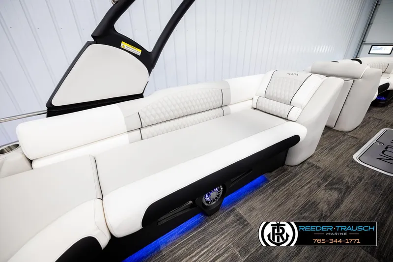 Slide: The Image of Luxurious 2026 Avalon Excal LTD CRB boat interior with elegant seating and ambient lighting. - 21