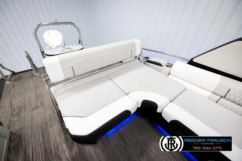 Slide: The Image of 2026 Avalon Excal LTD CRB boat interior with luxurious white seating and modern design. - 24