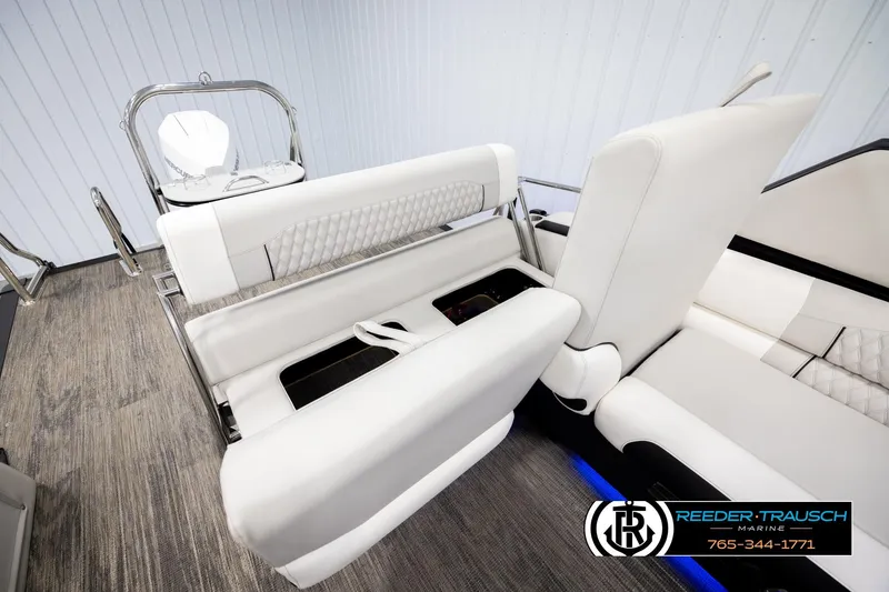 Slide: The Image of Luxurious interior of 2026 Avalon Excal LTD CRB boat with white seating and modern design. - 25