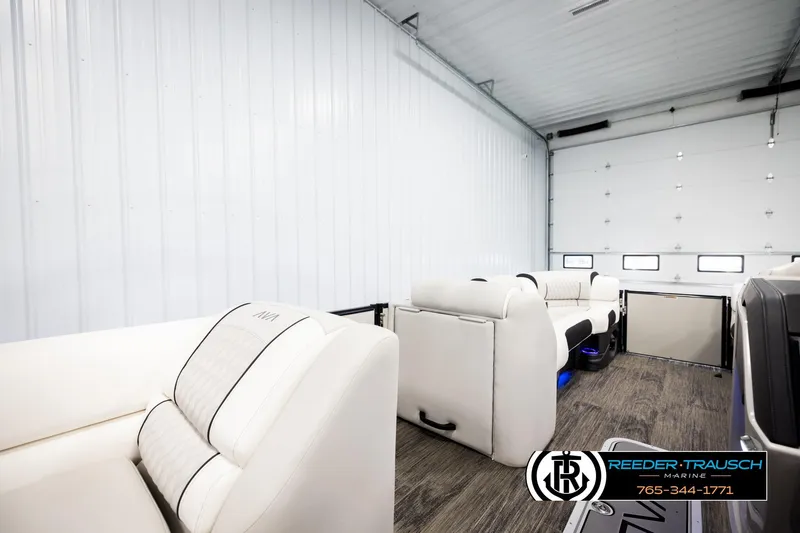 Slide: The Image of Luxurious interior of 2026 Avalon Excal LTD CRB boat with plush seating. - 30