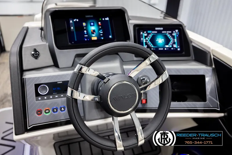 Slide: The Image of Steering wheel and dashboard of 2026 Avalon Excal LTD CRB boat with digital displays. - 33