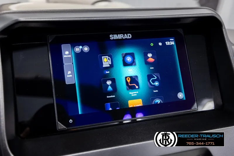 Slide: The Image of Simrad touchscreen display in 2026 Avalon Excal LTD CRB boat, featuring navigation and control apps. - 36