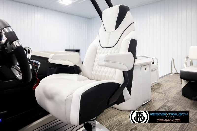 Slide: The Image of Luxurious white captain's chair in 2026 Avalon Excal LTD CRB boat interior. - 40