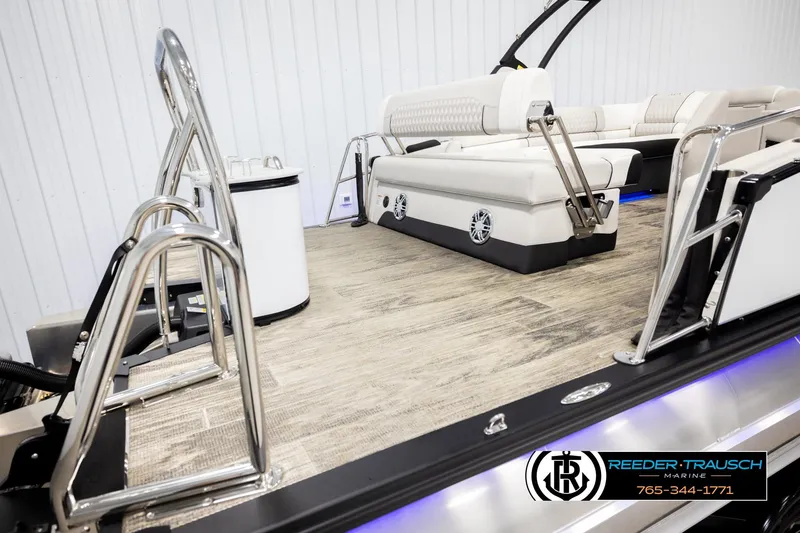 Slide: The Image of 2026 Avalon Excal LTD CRB boat interior with sleek seating and modern design. - 48