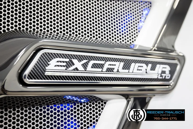Slide: The Image of Close-up of 2026 Avalon Excal LTD CRB logo with metallic and carbon fiber design. - 57