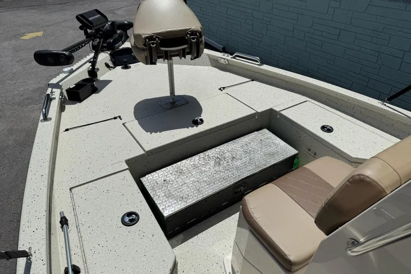 Slide: The Image of 2022 Xpress H20 BAY boat interior with seating, storage, and control panel. - 4