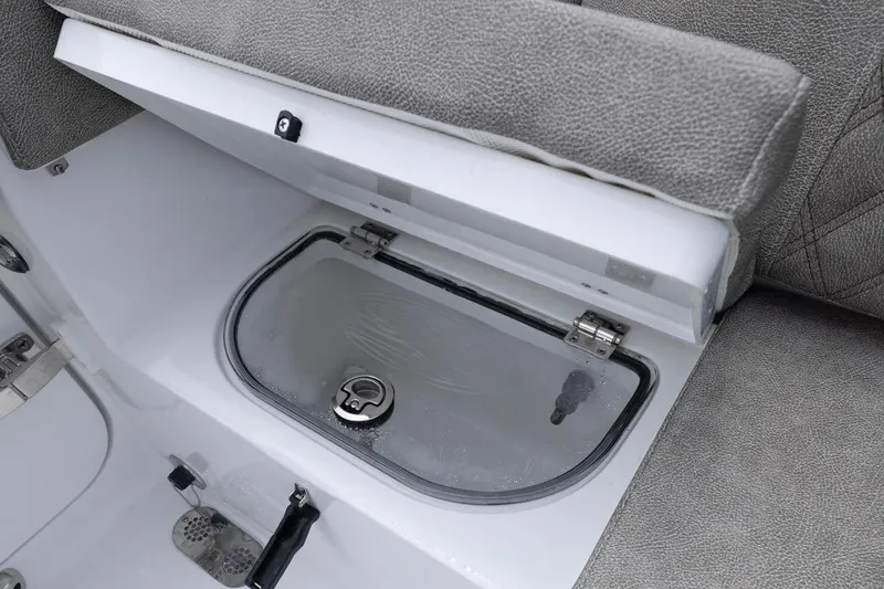Slide: The Image of Storage compartment on 2026 Sea Hunt Ultra 265 SE boat with gray seating. - 20