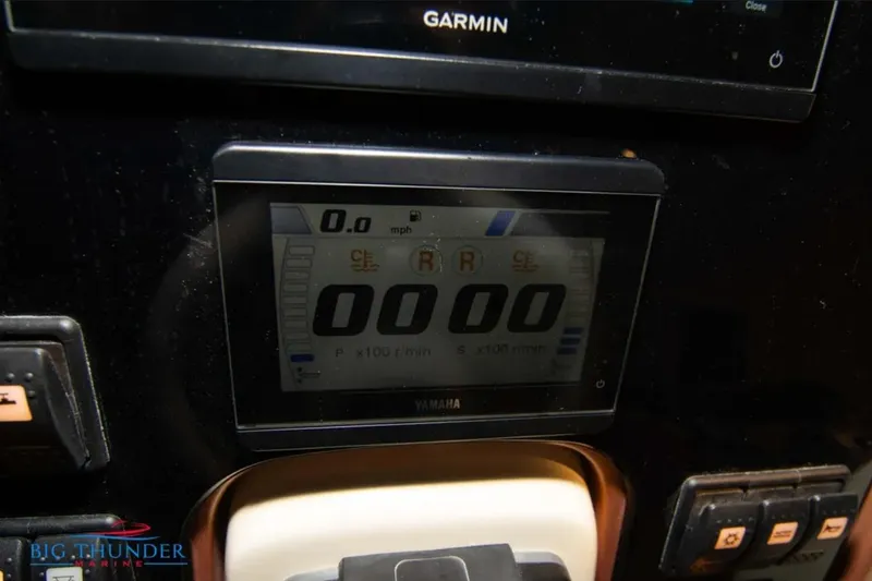 Slide: The Image of 2024 Capoforte FX270 dashboard with Garmin and Yamaha displays, featuring speed and control indicators. - 15