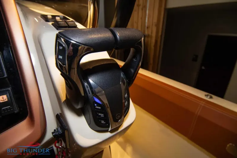 Slide: The Image of 2024 Capoforte FX270 boat throttle control in cockpit, featuring modern design and functionality. - 20
