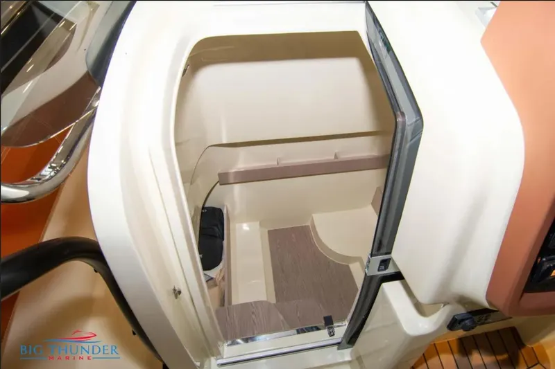 Slide: The Image of 2024 Capoforte FX270 interior cabin with modern design and wood accents. - 29