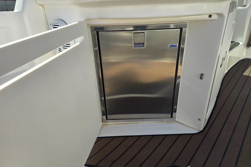 Slide: The Image of Stainless steel cabinet on 2003 Sea Ray 340 Sundancer boat deck. - 14