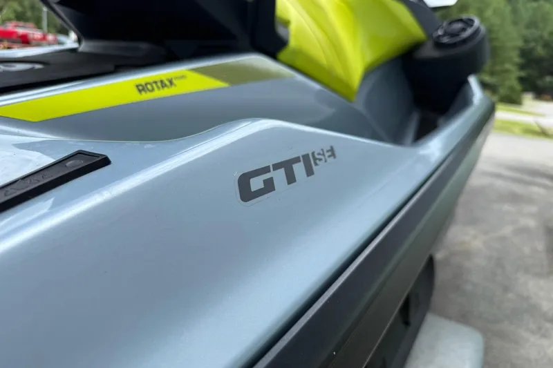 Slide: The Image of 2021 Seadoo GTI SE 130 with Sound System, close-up of sleek design and branding. - 4