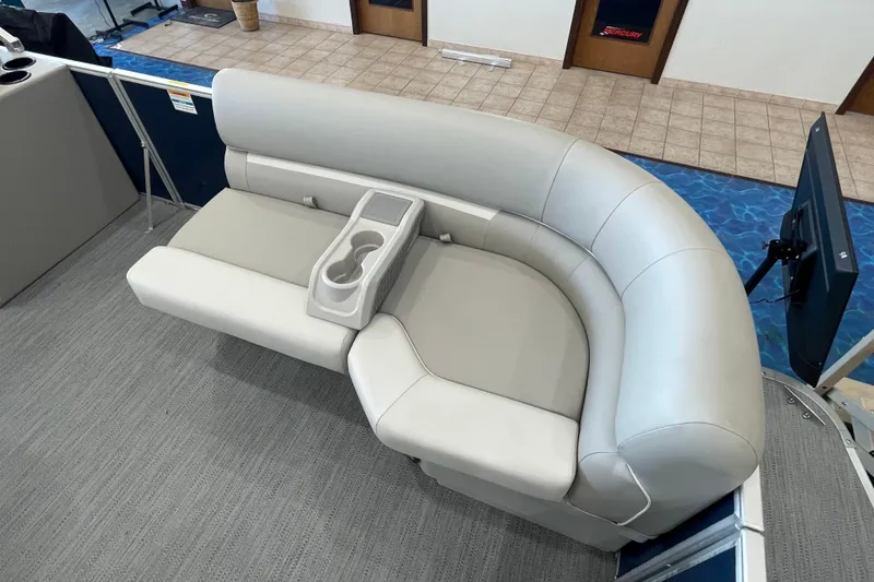 Slide: The Image of Luxurious seating on 2026 Godfrey Xperience 2086 CX pontoon boat, featuring cup holders. - 6