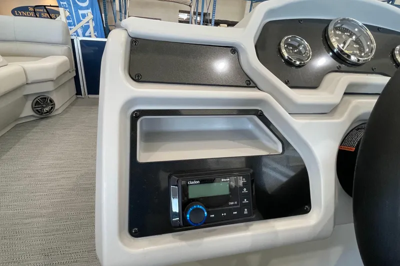 Slide: The Image of Dashboard of 2026 Godfrey Xperience 2086 CX boat with stereo and gauges. - 9