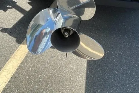 Slide: The Image of Close-up of a shiny boat propeller on a 2022 Sun Tracker Party Barge 20 DLX. - 11