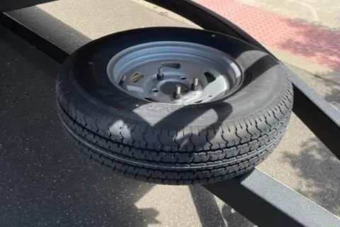 Slide: The Image of Spare tire mounted on a trailer for 2022 Sun Tracker Party Barge 20 DLX. - 15