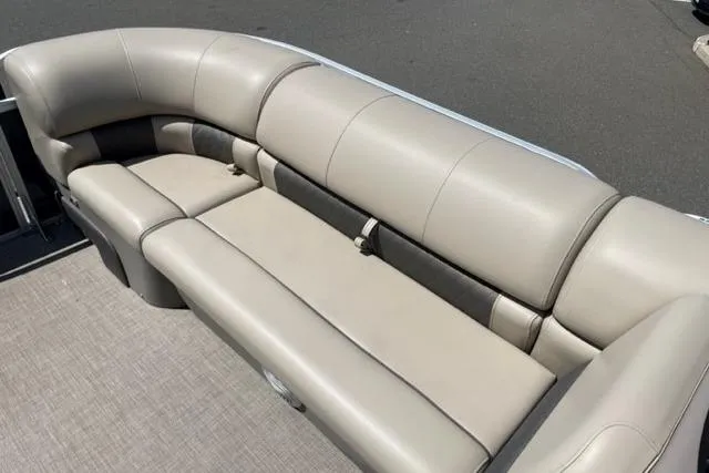 Slide: The Image of 2022 Sun Tracker Party Barge 20 DLX, beige seating, outdoor pontoon boat interior. - 6