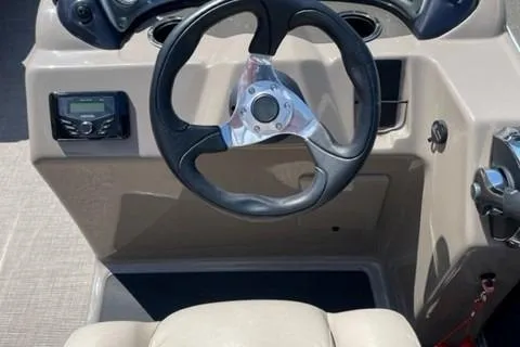 Slide: The Image of Steering wheel of 2022 Sun Tracker Party Barge 20 DLX pontoon boat. - 7