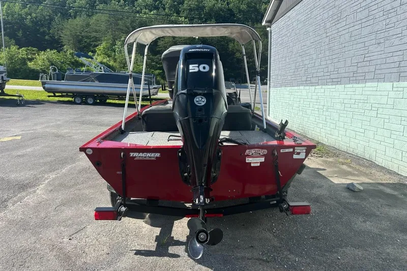 Slide: The Image of 2020 Bass Tracker Pro 170 boat with Mercury 50 engine, parked outdoors. - 3