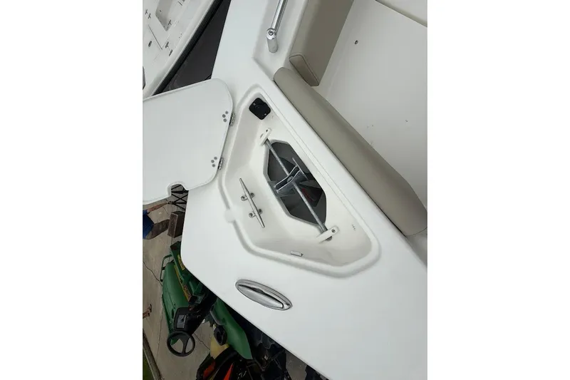 Slide: The Image of Open storage compartment on 2026 Key West 239 FS boat, showcasing interior details. - 21