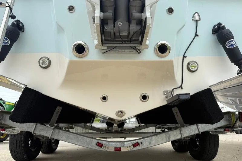 Slide: The Image of Rear view of 2026 Key West 239 FS boat on trailer, showcasing hull and fittings. - 4