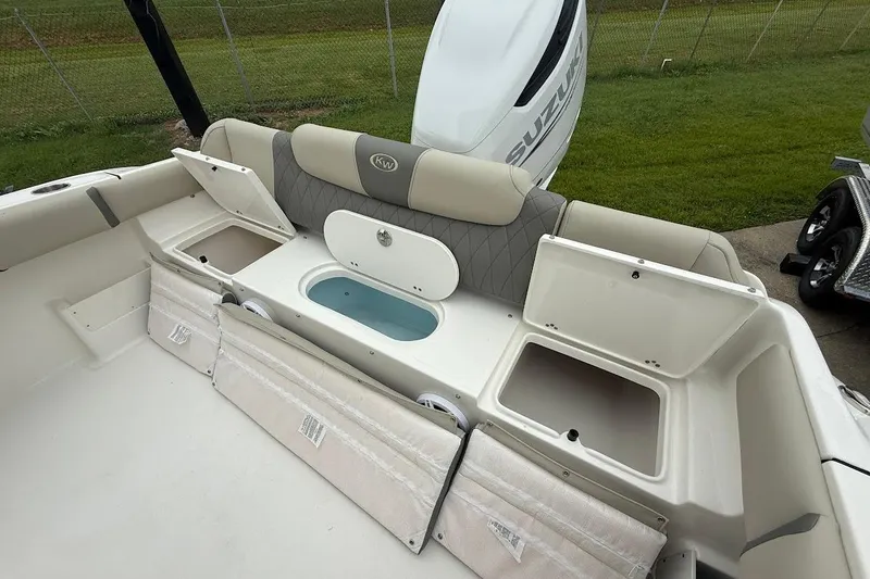 Slide: The Image of 2026 Key West 239 FS boat interior with storage compartments and seating. - 7