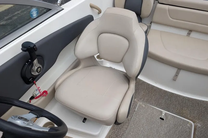 Slide: The Image of Interior of 2012 Chaparral 18 H2O Ski & Fish boat with beige seating. - 15