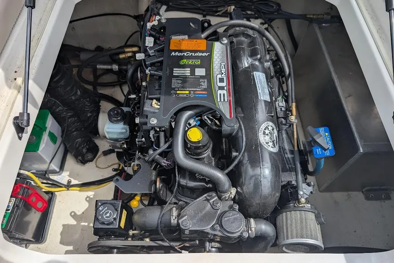 Slide: The Image of Engine compartment of 2012 Chaparral 18 H2O Ski & Fish boat, featuring MerCruiser 3.0 MPI. - 27