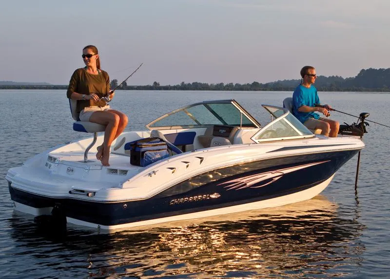 Slide: The Image of Manufacturer Provided Image: 2012 Chaparral 18 Ski & Fish H2O boat on a calm lake with two people fishing. - 29