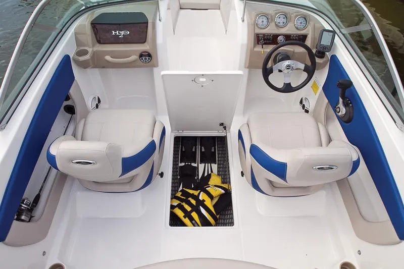 Slide: The Image of Manufacturer Provided Image: 2012 Chaparral 18 Ski & Fish H2O boat interior with seating and dashboard. - 34