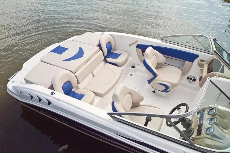 Slide: The Image of Manufacturer Provided Image: 2012 Chaparral 18 Ski & Fish H2O boat interior with white and blue seating. - 37