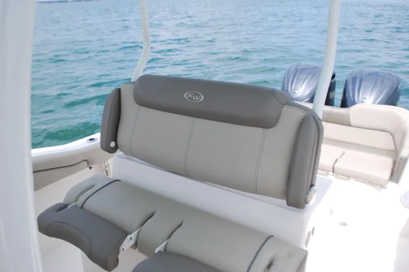 Slide: The Image of 2022 Key West 263 FS boat interior with comfortable seating and twin engines. - 10