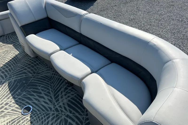 Slide: The Image of Luxurious seating on 2016 Crest Classic 250 SLR2 boat with patterned flooring. - 10
